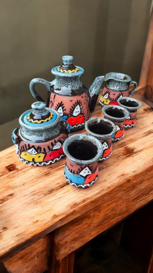 سحر نوبي — طقم شاي فخاري مرسوم يدويًا